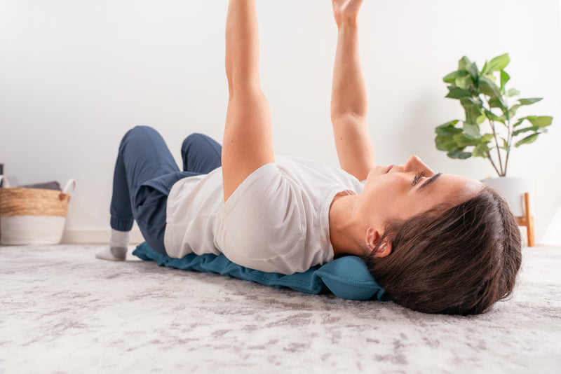 Photograph showing the HALO Spine Stretcher being used, demonstrating its functionality and fit.