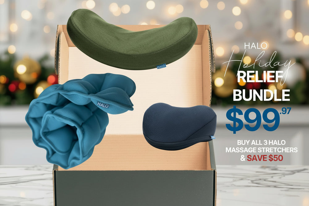 Halo massage stretchers in a box with holiday lights in the background